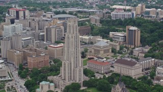 AX105_104E - 4.8K aerial stock footage approaching University of Pittsburgh, Pennsylvania