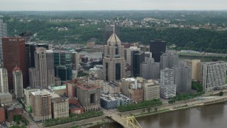 AX105_128 - 4.8K aerial stock footage approaching Fifth Avenue Place, Downtown Pittsburgh, Pennsylvania