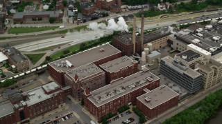 AX105_141 - 4.8K stock footage aerial video flying over HJ Heinz Plant, Pittsburgh, Pennsylvania