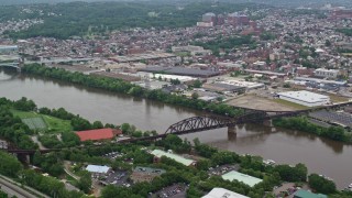 AX105_142E - 4.8K aerial stock footage of bridges over Allegheny River, Pittsburgh, Pennsylvania