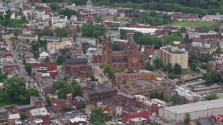 AX105_147 - 4.8K aerial stock footage orbiting Our Lady of the Angels Parish Church, Pittsburgh, Pennsylvania