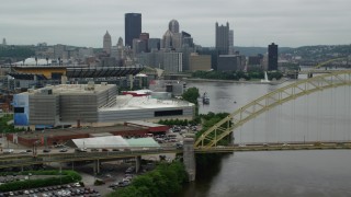 AX105_159 - 4.8K aerial stock footage of the West End Bridge and downtown skyline, Downtown Pittsburgh, Pennsylvania