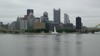AX105_162 - 4.8K aerial stock footage approaching a fountain at Point State Park, Downtown Pittsburgh, Pennsylvania
