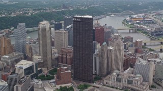 AX105_181E - 4.8K aerial stock footage approaching U.S. Steel Tower skyscraper, Downtown Pittsburgh, Pennsylvania