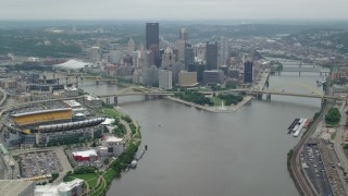 AX105_195 - 4.8K aerial stock footage approaching Downtown Pittsburgh, Pennsylvania