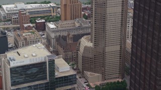 AX105_201E - 4.8K aerial stock footage flyby skyscraper to reveal courthouse and skyscrapers, Downtown Pittsburgh, Pennsylvania