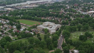 AX105_208 - 4.8K aerial stock footage flying over high school, Pittsburgh, Pennsylvania
