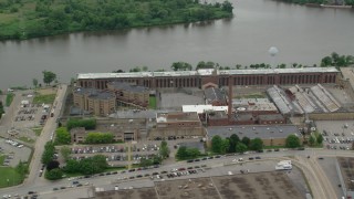 AX105_209 - 4.8K aerial stock footage orbiting Western State Penitentiary, Pittsburgh, Pennsylvania