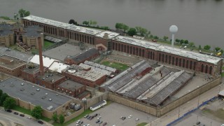 AX105_210 - 4.8K stock footage aerial video orbiting Western State Penitentiary, Pittsburgh, Pennsylvania