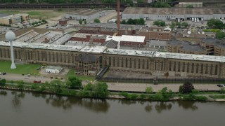 AX105_213 - 4.8K stock footage aerial video orbiting Western State Penitentiary, Pittsburgh, Pennsylvania