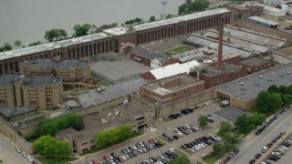 AX105_216 - 4.8K stock footage aerial video orbiting Western State Penitentiary, Pittsburgh, Pennsylvania