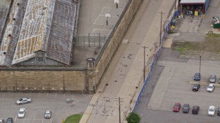AX105_217 - 4.8K stock footage aerial video orbiting a guard tower at Western State Penitentiary, Pittsburgh, Pennsylvania