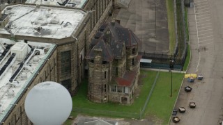 AX105_219 - 4.8K stock footage aerial video of an old building at Western State Penitentiary, Pittsburgh, Pennsylvania