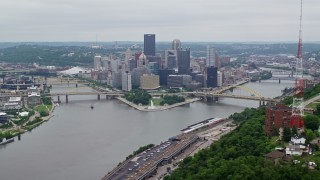 AX105_227E - 4.8K aerial stock footage of skyscrapers and rivers in Downtown Pittsburgh, Pennsylvania
