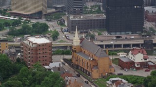 AX105_232 - 4.8K aerial stock footage orbiting St. Mary of the Mount Church on a Hillside, Pittsburgh, Pennsylvania