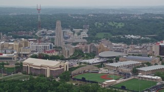 AX105_236E - 4.8K aerial stock footage flyby sports fields at University of Pittsburgh, Pennsylvania