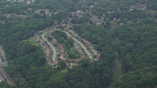 AX105_251 - 4.8K aerial stock footage of suburban neighborhoods, Verona, Pennsylvania
