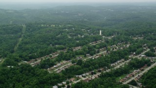 AX105_255 - 4.8K aerial stock footage flying over suburban neighborhoods, Verona, Pennsylvania