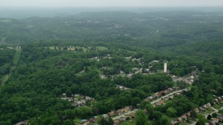 AX105_256 - 4.8K aerial stock footage flying over suburban homes, Verona, Pennsylvania