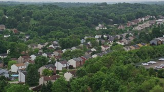 AX105_263 - 4.8K aerial stock footage of a quiet neighborhood, Penn Hills, Pennsylvania