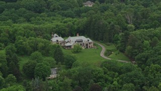 AX106_007 - 4.8K aerial stock footage of a mansion by the Woods, Pittsburgh, Pennsylvania
