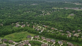 AX106_011E - 4.8K aerial stock footage flying over an upscale neighborhood, Allison Park, Pennsylvania