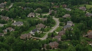 AX106_015E - 4.8K aerial stock footage of upscale homes in Allison Park, Pennsylvania