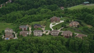 AX106_022 - 4.8K aerial stock footage flying over upscale homes, Wexford, Pennsylvania