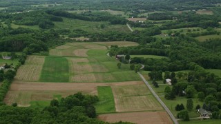 AX106_030E - 4.8K aerial stock footage farmland in Zelienople, Pennsylvania