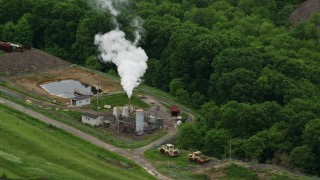 AX106_033 - 4.8K aerial stock footage orbiting Recycling Center Furnace, Zelienople, Pennsylvania