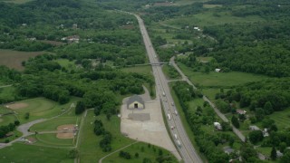 AX106_035 - 4.8K aerial stock footage of light traffic on Interstate 75, Rochester, Pennsylvania