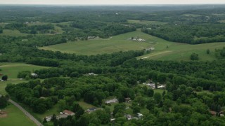 AX106_041 - 4.8K aerial stock footage of farmland in Beaver Falls, Pennsylvania