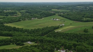 AX106_041E - 4.8K aerial stock footage of farmland in Beaver Falls, Pennsylvania