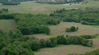 AX106_051 - 4.8K aerial stock footage of farmland in New Galilee, Pennsylvania
