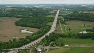 AX106_052 - 4.8K aerial stock footage approaching Interstate 76 with light traffic in New Galilee, Pennsylvania