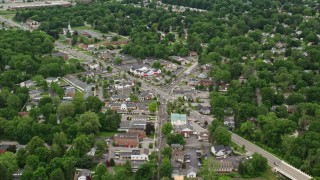 AX106_071E - 4.8K aerial stock footage of shops in small town, Youngstown, Ohio