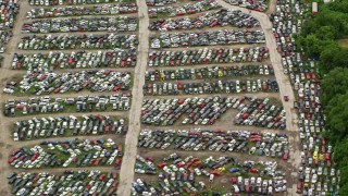 AX106_074E - 4.8K aerial stock footage of an auto junkyard in Youngstown, Ohio