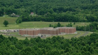 AX106_078 - 4.8K aerial stock footage approaching Ohio State Penitentiary, Youngstown, Ohio