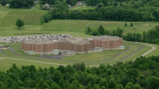 AX106_079 - 4.8K aerial stock footage orbiting Ohio State Penitentiary, Youngstown, Ohio