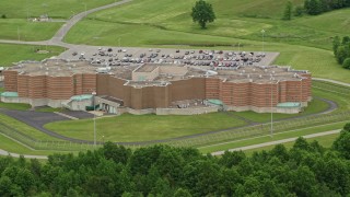 AX106_079E - 4.8K aerial stock footage orbiting Ohio State Penitentiary, Youngstown, Ohio