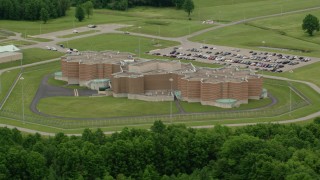 AX106_081 - 4.8K stock footage aerial video orbiting Ohio State Penitentiary, Youngstown, Ohio