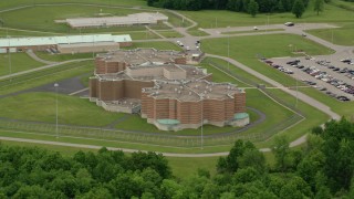 AX106_082 - 4.8K aerial stock footage orbiting the side of the Ohio State Penitentiary, Youngstown, Ohio