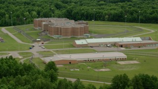 AX106_089 - 4.8K aerial stock footage orbiting Ohio State Penitentiary, Youngstown, Ohio