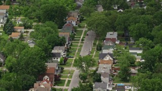 AX106_108E - 4.8K aerial stock footage of suburban neighborhoods, Niles, Ohio