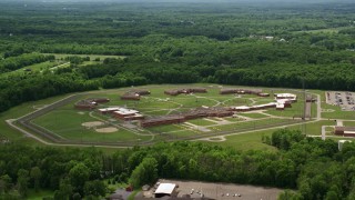 AX106_121 - 4.8K aerial stock footage orbiting Trumbull Correctional Institute Prison in Leavittsburg, Ohio