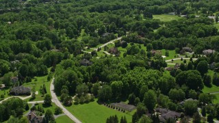 AX106_179E - 4.8K aerial stock footage of Mansions in Chagrin Falls, Ohio