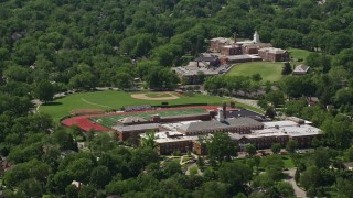 AX106_189 - 4.8K aerial stock footage approaching a high school in Shaker Heights, Ohio