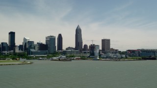 AX106_206 - 4.8K aerial stock footage of the skyline and waterfront stadium in Downtown Cleveland, Ohio