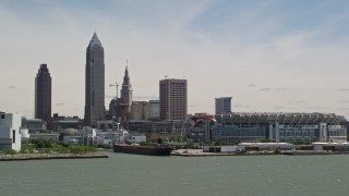 AX106_207 - 4.8K stock footage aerial video of skyline and waterfront stadium in Downtown Cleveland, Ohio