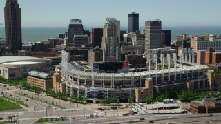 AX106_221 - 4.8K aerial stock footage of Progressive Field baseball stadium in Downtown Cleveland, Ohio